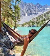 Girl in hammock in the mountains